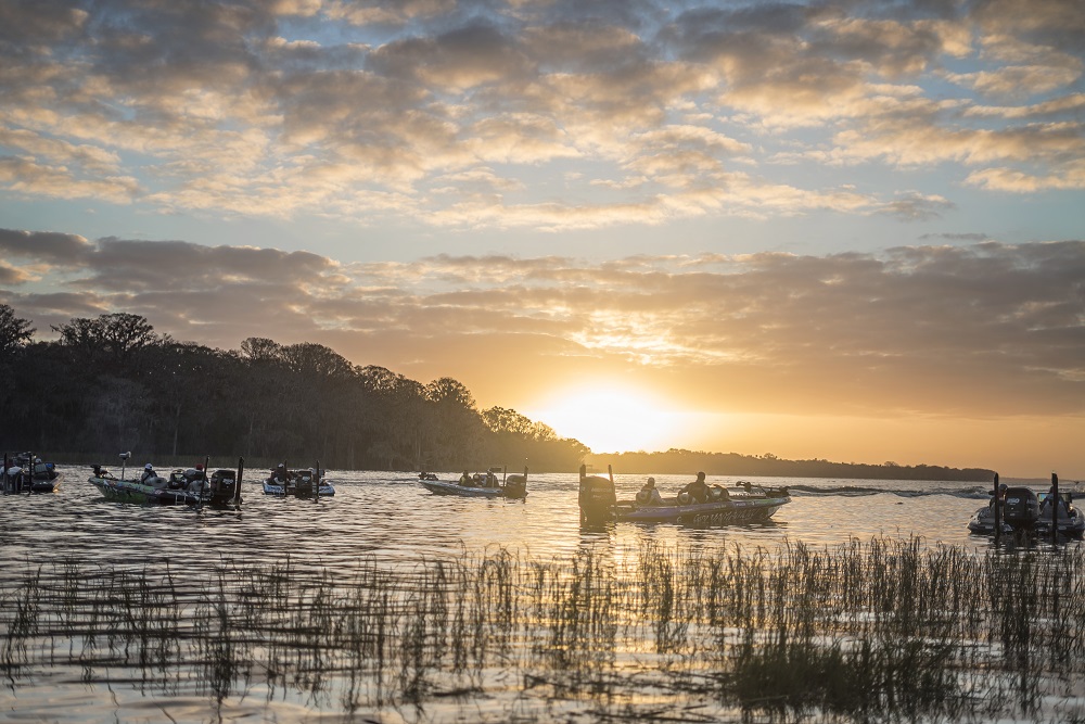 Lake Harris Sunrise with bass fishing boats at Venetian Gardens