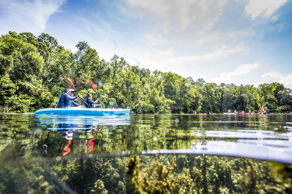 Father and son in a kayak on Alexander Springs