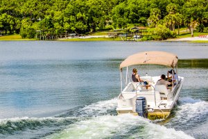 A family enjoys a day on the boat. 