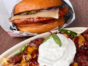 Photo of burger and loaded fries.