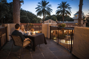 A young couple enjoys dinner al fresco at Mission Inn Resort & Club.