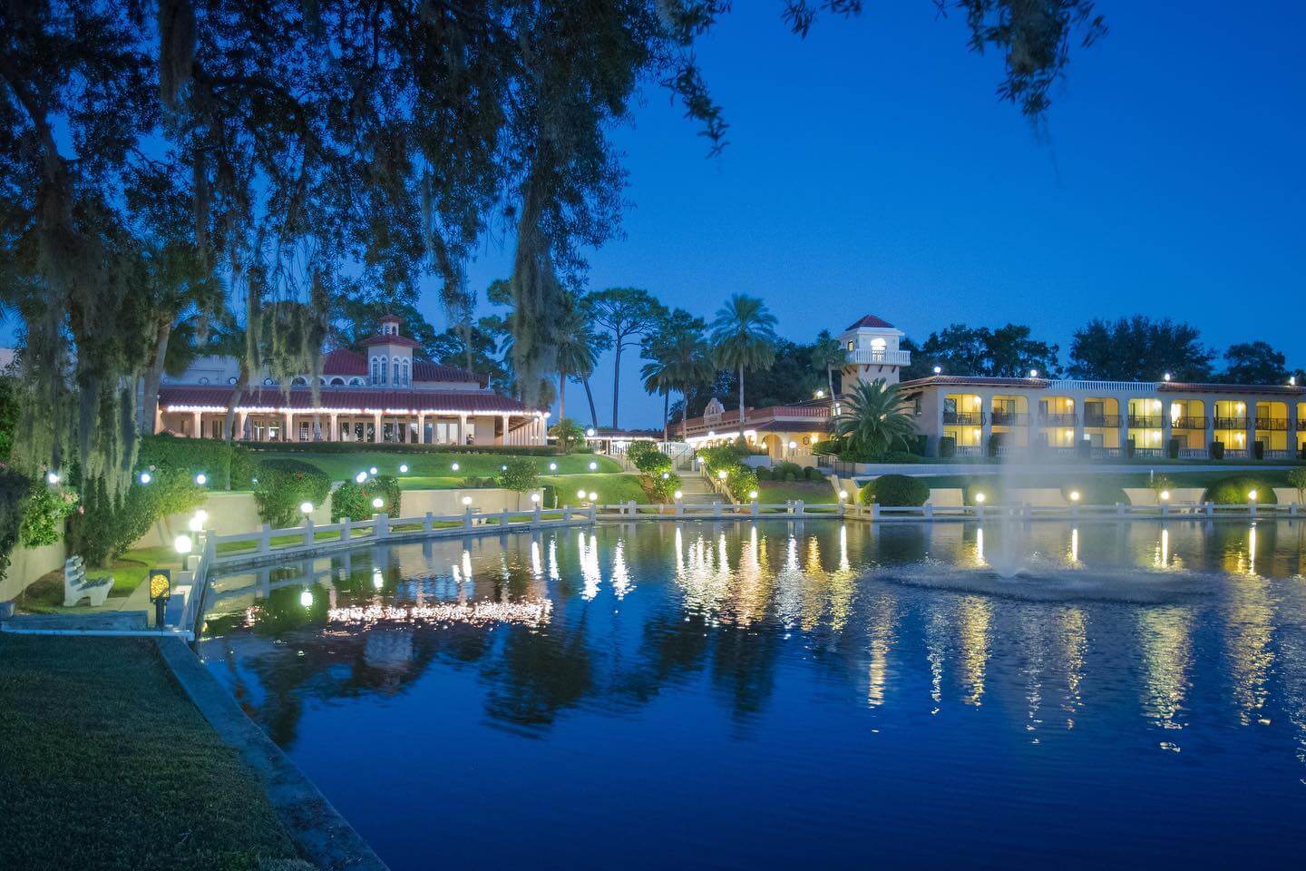 Photo of Mission Inn Resort & Club at dusk.