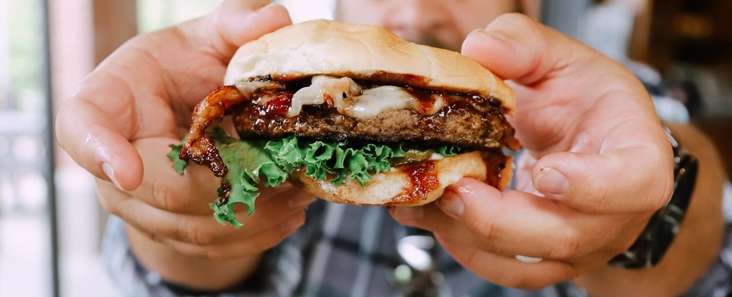 Close up photo of a hamburger.