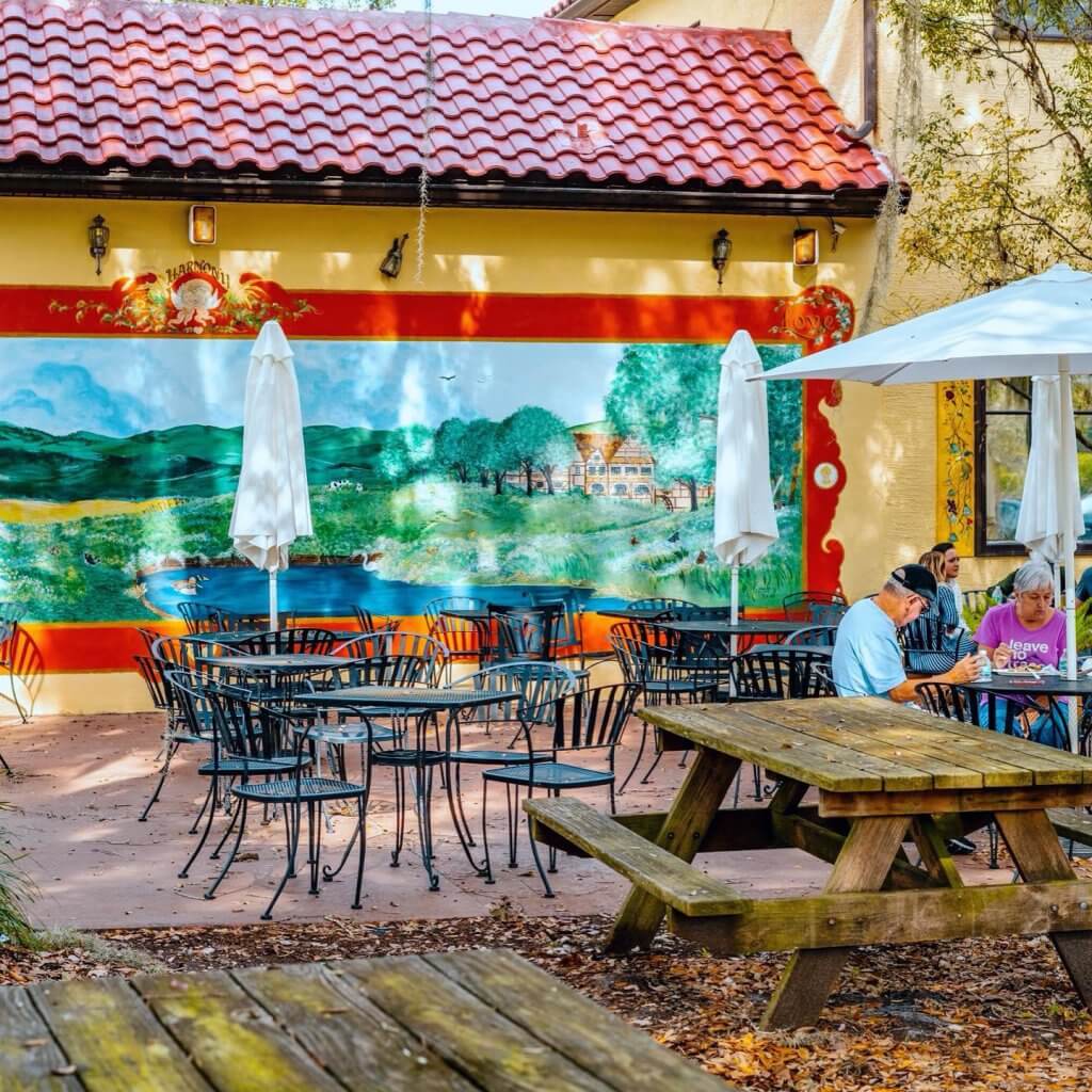 outside patio seating at Yalaha Bakery with people dining